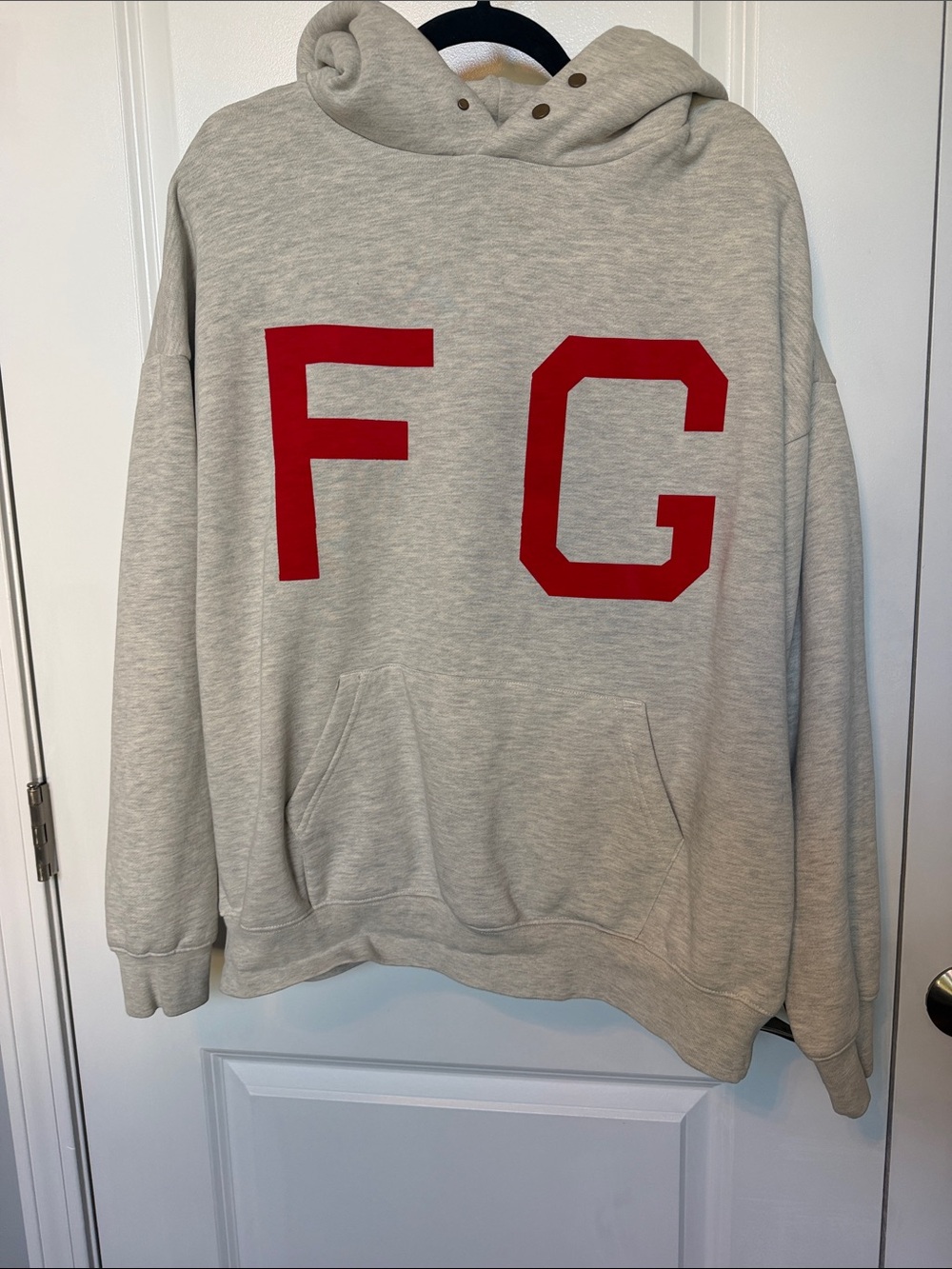 Fear of God Light Gray Crewneck Hoodie with Red FG Graphic
